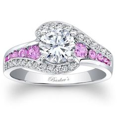 a diamond and pink sapphire engagement ring