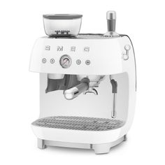 the delong espresso machine is white and has an automatic coffee maker on it