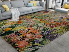 a living room filled with furniture and colorful rugs