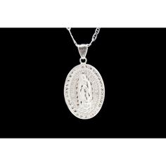 "Our Lady of Guadalupe Necklace 100% .925 Silver Chain is 22\" - 3mm Pendant Measures 1 3/4\" Limited Edition Virgen de Guadalupe con Cadena Cadena y Medalla son de .925 Plata Solida Edicion Limitada La Cadena es de 22\" y 3mm La Medalla mide 1 3/4\"" Silver Our Lady Of Guadalupe Pendant Jewelry, Spiritual Silver Necklace With Our Lady Of Guadalupe, Sterling Silver Necklace With Miraculous Medal, Silver Miraculous Medal Round Pendant, White Gold Miraculous Medal Jewelry In Sterling Silver, Sterling Silver Oval Necklace With Miraculous Medal, Oval Sterling Silver Necklaces With Miraculous Medal, Silver Spiritual Necklace With Oval Shape, White Gold Miraculous Medal Round Pendant