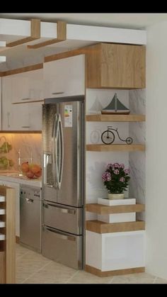 a modern kitchen with stainless steel appliances and wooden shelves