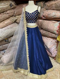 Navy blue plain lehenga with gold border teamed with beautiful cut dana and stone work blouse and contrasting ivory net dupatta. Fabric: Silk Occasion: Wedding Ceremony or Reception. WASH CARE INSTRUCTIONS - Please Dry clean only when it is applicable. Slight color variation is possible due to digital photography. This outfit can be customized in multiple colors and specific to client measurements. 120 days of production time is required and are for bulk orders only!Order are processed in store Blue Plain Lehenga, Lehenga Yellow, Bridesmaids Lehenga, Plain Lehenga, Navy Blue Lehenga, Chaniya Choli Wedding, Stone Work Blouse, Navy Blue Bridesmaids, Bridesmaid Lehenga