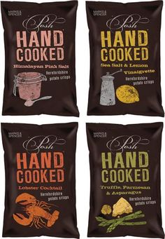 four bags of hand cooked food sitting on top of each other