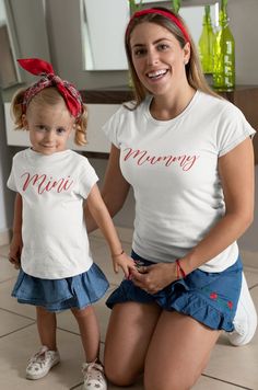 "A t-shirt for mummy and daughter to match. Mum's t-shirt says \"mummy\" and Daughters says \"mini\". Perfect for you and your little mini me! Comes in white with red writing or black with white writing. Each purchase includes a mummy and a mini t-shirt.  100% cotton crew neck t-shirt with twin needle stitching detail on sleeves and hem. Design is personally made with high quality vinyl. Ladies sizes have side seams that provide a feminine fit All our items are personally produced by our small family business. Approximate time from order being placed to being dispatched is 3-4 working days although we aim for this to be quicker. Care instructions will be included within packaging to help you keep your garment in perfect condition. The colour in the pictures do not represent an exact match T Shirt Press, Mother Daughter Shirts, Mommy And Me Shirt, Matching Mom, Mama T Shirt, Mommy And Me Outfits, Mama Shirts, Heart Shirt, Mother And Daughter