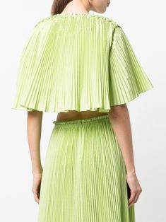 Find ROSIE ASSOULIN Pleated Cropped Blouse on Editorialist. lime green cotton blend fully pleated plunging V-neck short sleeves front tie fastening cropped Conscious: We've partnered with Good On You – an ethical agency that rates how sustainably brands perform. This product comes from a brand that performs well in relation to their impact on animals. Pleated Crop Top, Pleated Tops, Flower Collection, Printed Gowns, Rosie Assoulin, Pleated Top, Cropped Blouse, Pleat Top, Crop Top Blouse