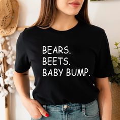 "Bears Beets Baby Bump Shirt, Pregnancy Announcement, Baby Shower Gift, The Office, Dwight Schrute, Mommy To Be Shirt, Funny Pregnancy Tee 📢Please Check All Photos For Details.   📢Choose Your T-Shirt Size From The Drop-Down Lists Next To The item Picture   📢Choose Of Your T-Shirt Color From The 2nd Picture   📢Use \"Add message to Seller\" link On The Checkout Page To Send me the Following important Details For Your Order's Customization.   📢Shipping Time Varies by location (we are located in Sugar Land, Texas) please consider that our turn around time is 1 to 3 business days.   ⭐Which brand do you use for t-shirts? We use Gildan Soft Style, Bella Canvas Unisex, Rustic United, Outlash, Tees Factory, Hanes, Comfort Color District and Next Level when we have a shortage of stocks for cert Ketanji Brown Jackson, Ruby Bridges, Sarcastic Women, Hipster Women, Mommy Shirts, Pregnancy Announcement Shirt, Harriet Tubman, Maternity Tees, Rosa Parks