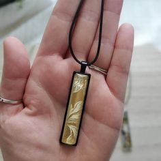 "Discover the perfect fusion of artistry and fashion with this Long Rectangle Pendant Necklace!  Elevate your style, captivate attention, and make a statement that's uniquely you. 🎨 This pendant tells a story through its abstract and colorful mixed media design. Crafted by a skilled artist, this pendant is truly one of a kind. 🌼 This necklace is more than an accessory; it's a reflection of your personality. Add an artistic touch of wearable art to your every day.  🎁 This necklace could be a perfect gift for a woman in your life who appreciate creativity, uniqueness, and quality. Product Details: ✨ Materials: This pendant feature an abstract, colorful mixed media design sealed with a clear glass cabochon dome, preserving the intricate design while adding a captivating 3D effect. ✨ Chain: Black Jewelry With Artistic Design As Gift, Handmade Adjustable Necklace With Rectangular Pendant, Adjustable Rectangular Necklace As A Gift, Adjustable Rectangular Necklace For Gifts, Handmade Yellow Rectangular Jewelry, Adjustable Rectangular Necklace For Gift, Handmade Square Jewelry As Gift, Handmade Square Jewelry Gift, Yellow Bohemian Rectangular Jewelry