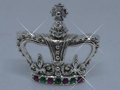 My other listings ➡️ https://www.Etsy.com/uk/shop/BeeHappyJewelleryBee * Very Pretty Crown/Tiara brooch pin, marcasite, ruby and emeralds inset * Hallmarked 925 on back * Swivel pin safety clasp * Measurements : 2.8cm(l) x 2.8cm(w) * A very pretty brooch, perfect gift for the Queen/Princess of your life  Will look pretty on a hat too! Crown Brooch, Ruby Wedding Anniversary, Reine Elizabeth Ii, Queen Princess, Crown Tiara, Ruby Wedding, Bee Brooch, Ruby Emerald, Keepsake Jewelry