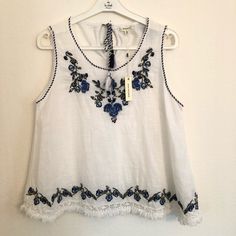 Cotton Embroidered Loose Fit Top So Cute With Shorts Or Jeans Ptp 20” Last Picture For Reference Summer Tops With Contrast Embroidery, Casual Embroidered Top With Hem Detail For Spring, Spring Embroidered Top With Contrast Embroidery, Sleeveless Embroidered Top With Geometric Design For Spring, Casual Embroidered Top With Tonal Embroidery For Summer, Casual Embroidered Top With Hem Detail For Vacation, Casual Embroidered Top For Summer, Spring Vacation Embroidered Top With Embroidered Hem, Wide Sleeve Top