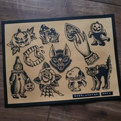 an image of halloween stickers on a wooden surface with the words, pumpkins and cats