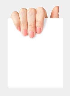 a woman's hand holding up a blank sign