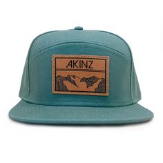 Our classic tradesman hat with a sustainable twist, made of alpine blue organic cotton with a full fabric back. Leather patch features the classic Akinz Elevation geometric mountains design. Hybrid 5 panel / flat bill fit. One size fits most. Adjustable back. LIMITED RUN. ONLY 12 AVAILABLE. Blue Adjustable Flat Cap Snapback Hat, Adjustable Blue Flat Cap Snapback Hat, Blue Flat Brim Baseball Cap For Outdoor Activities, Adjustable Snapback Hat With Flat Bill For Hiking, Adjustable Flat Bill Snapback Hat For Hiking, Flat Bill Snapback Hat For Hiking, Adjustable Fit Snapback Hat With Flat Bill For Outdoor, Outdoor Flat Bill Snapback Hat, Blue 5-panel Snapback Hat For Outdoor