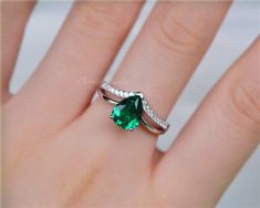 7*9 mm pear cut Emerald ring, made with 925 sterling silver, plated with white gold, beautiful as promise ring, anniversary gift. Main Stone: 7*9 mm simulated emerald/ lab created Emerald Side Stone: CZ CS0121 Custom order accepted, if need different stone or material, just feel free to contact us.:) Home page: https://www.etsy.com/shop/CarrieStudio?ref=seller-platform-mcnav Silver Teardrop Emerald Ring For Wedding, Silver Teardrop Emerald Wedding Ring, Silver Teardrop Emerald Ring For Anniversary, Lab Created Emerald, Ring Emerald, Emerald Engagement, Emerald Engagement Ring, Anniversary Ring, Emerald Ring