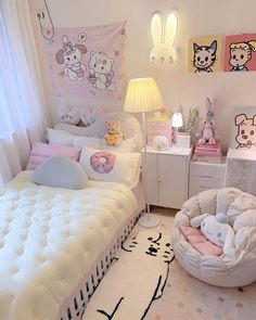 a bedroom with hello kitty decorations on the walls