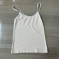 Brandy Melville Striped Tank Top Never Worn One Size Material - Light And Breathable Pink Cotton Camisole Top, Pink Cotton Cami Top, Spring Peach Cotton Tank Top, Striped Stretch Cami Top, Pink Casual Cami Top, Casual Pink Cami Top, Peach Cotton Tank Top, Casual Peach Cotton Tank Top, Tops Brandy Melville