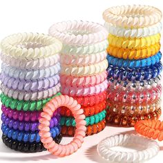 ?Best Hair Ties Material?The hair coils are made of Soft sturdy and durable thermoplastic polyurethane which no pungent smell and no metal,The spiral hair ties are gentle on your hair,the smooth plastic,spiral design will prevent tanlging and prevents hair breakage when you remove them. ?Mighty Hair Elastic and resilience? The diameter of elastic hair ties are 1.97 inches and 2.17 inches in diameter, but don't be deceived by its size!DED coils hair bands stretch freely and copiously to longer size to hold up all of your hair in a ponytail,messy bun or braid hairstyle.and also can be worn on your wrist as a hair bracelet when not in use.Give zest to your fashion hairstyle and lifestyle. ?Waterproof Hair Ties for Women Girls?Phone coil hair ties are non absorbent, no nasty wet feeling when y No Crease Hair Ties, Coil Hair Ties, Spiral Hair Ties, Best Hair Ties, Ponytail Messy, Thinning Thick Hair, Hair Bracelet, Twisted Hair, Hair Tie Bracelet