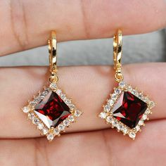 3CT Princess Cut Red Garnet Halo Drop Dangle Earrings 14k Yellow Gold Over  THIS PENDANT IS READY TO MADE A ORDER  ✔ Type : Earring  ✔ Style : Dangle Earring  ✔ Main Stone : Garnet Stone     ✔ Main Stone Color : Red ✔ Main Stone Shape :  Princess     ✔ Metal Purity : 925 Sterling Silver ✔ Main Stone Creation : Simulated ✔ Total Carat Weight : 2.50 Ct  ✔ Metal Finish  : 14k Yellow Gold Finish  ✔ Ready to Ship in 3-5 Business Days ♥ Custom Birthstone Ring ♥  The most unique jewelry you can find, p Fine Jewelry Red Dangle Earrings, Red Drop Earrings For Valentine's Day, Elegant Red Drop Earrings, Red Classic Jewelry With Matching Earrings, Classic Red Jewelry With Matching Earrings, Elegant Red Earrings For Valentine's Day, Elegant Red Dangle Jewelry, Formal Drop Earrings For Valentine's Day, Red Drop Earrings Fine Jewelry