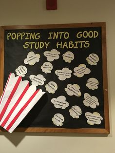 a blackboard with popcorn and some writing on it that says popping into good study habitats