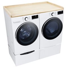 a white washer and dryer sitting side by side on top of each other