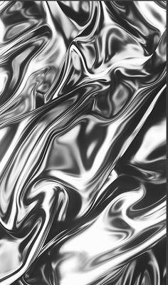 an abstract black and white photo with wavy lines