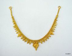 ethnic 20kt gold necklace choker from rajasthan india. great handmade design made of solid 20kt yellow gold. nice handmade design good for jewelry collection. Note - we provide adjustable cord to wear this necklace.   length - 21.2 cm(8.34") width max . - 2.2 cm(0.86") weight approx - 10.6 grams material - 20kt yellow gold. spj Note-All the items appear In Pictures larger than actual in size so please check measurements carefully before purchase. Traditional Gold Choker For Celebration, Traditional Handmade Yellow Gold Necklace, Traditional Gold Choker For Festivals, Traditional 22k Gold Choker For Festivals, Gold Choker Bengali Design, Gold Necklace Choker, Rajasthan India, Necklace Choker, Choker Necklaces