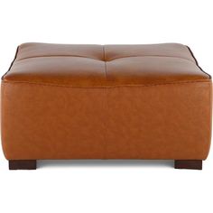 a brown leather ottoman sitting on top of a white floor