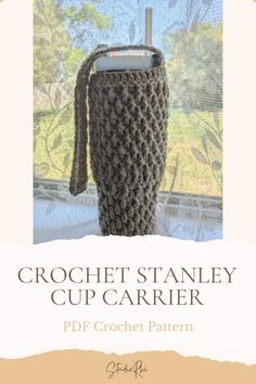 the crochet stanley cup carrier pattern is shown in front of a window with trees outside