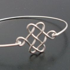 Celtic Knot Bracelet  Silver Celtic Bangle Celtic by FrostedWillow, $14.95 Silver Wire Wrapped Bracelets For Wedding, Silver Bracelet Jewelry For Bridesmaid Gift, Silver Bracelet For Bridesmaid Gift, Silver Adjustable Bracelets For Wedding Gift, Silver Adjustable Bracelet For Wedding Gift, Adjustable Sterling Silver Jewelry For Wedding Gift, Silver Bracelet For Wedding Gift, Silver Bracelet Jewelry For Wedding Gift, Silver Bangle Jewelry For Wedding Gift