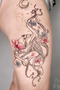 a woman's thigh with an octopus and flowers on it