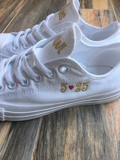 Make your day extra special with these beautiful Embroidered Monochrome Converse with your monogram on the tongue. Or your first and last name. Or Mr Smith ie. I will then add you wedding date to the side of the shoe. Either like 6/2/18 or 6/2. You can choose either all black or all white, they have NO lines around the sole as other converse do. You choose you thread color... hearts will be RED unless other color is specified. When placing your order: Please note thread color in notes section Fi Custom White Sneakers With Round Toe For Anniversary, White Custom Sneakers With Round Toe For Anniversary, White Low-top Wedding Shoes For Bride, White Low-top Wedding Shoes For Bridal Shower, White Low-top Bridal Sneakers, White Wedding Sneakers With Custom Embroidery, Customizable Low-top Wedding Shoes For Anniversary, Customizable Low-top Wedding Shoes For Bride, Customizable Low-top Sneakers For Anniversary