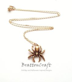 I love this Gold Spider Necklace! The charm is made of pewter, has an antique gold finish and is made in the USA. The spider is 5/8 inches long and 5/8 inches wide. The 16 inch Vermeil (gold plated sterling silver) Forzentina link chain shown is 1.1mm thick. The chain is a cable style chain with a diamond cut, finished with a spring ring clasp and made in Italy. An 18 inch chain is available in the same style along with a 20 inch box style chain. Make your selection at check out. This beautifull Spider Jewelry, Spider Necklace, Jewelry Halloween, Halloween Necklace, Williamsburg Va, The Spider, Halloween Jewelry, Cute Necklace, Same Style