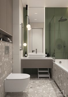 a modern bathroom with green walls and marble flooring, along with a white bathtub