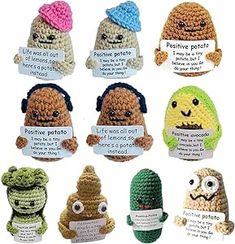 there are many crocheted stuffed animals that have signs in their mouths to describe what they are