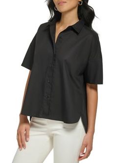 Perfect for pairing with your favorite dress pants, this collared shirt from Calvin Klein creates a polished look every time. | Calvin Klein Women's Essential Short Sleeve Poplin Shirt, Black, Small Calvin Klein Button-up Shirt For Business Casual, Fitted Calvin Klein Short Sleeve T-shirt, Casual Calvin Klein Button-up Shirt, Black Spring T-shirt With Button Closure, Black Calvin Klein Crew Neck T-shirt, Calvin Klein Woman, Women Essentials, Poplin Shirt, Dolman Sleeve