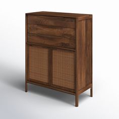 a wooden cabinet with wicker doors on the front and bottom, against a white background