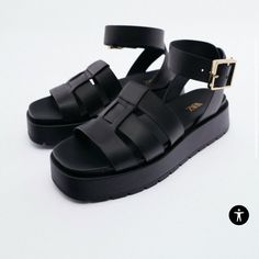 Brand New Zara Black Authentic Leather Fisherman Sandals Never Worn! Some Leather Marks On The Strap Where The Buckle Has Been Sealed While Stored. Photos With The Red Background Are My Own And Of The Actual Pair Being Sold. Size 9. Eu 40. Sold Out Online. Perfect For Summer Time! Can Also Be Worn With Socks For Fall As Seen On Celebs! No Box. Leather Upper. Platform Heel 1.6 Inch Heel And Adjustable Gold Color Strap. Marked Nwt Because It’s New But It Did Not Come With Tags. Will Be Mailed In A Chic Sandals With Chunky Platform And Flat Heel, Chic Flat Heel Chunky Platform Sandals, Zara Black Sandals With Buckle Closure, Zara Black Flat Heel Sandals, Trendy Zara Leather Sandals, Zara Black Leather Sandals, Zara Leather Sandals With Block Heel, Zara Platform Sandals With Block Heel, Zara Closed Toe Platform Sandals