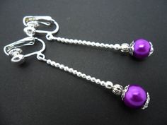 A pair of pretty long purple glass crystal  bead   dangly clip on  earrings. Elegant Purple Dangle Clip-on Earrings, Diy Jewelry Projects, Jewelry Making Earrings, Great Gifts For Mom, Beaded Dangle Earrings, Purple Glass, Glass Crystal, Beaded Dangles, Jewelry Projects