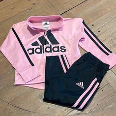 Adidas Pant And Jacket Tracksuit Set. Full Zipper With Pockets On Both Jacket And Pants. Color: Jacket Is Pink And Pants Are Black. Nwt. Perfect Condition. Size 2t Coming From A Nonsmoking/ Pet Friendly Home. Sporty Pink Long Sleeve Sets, Casual Pink Outerwear For Playwear, Pink Long Sleeve Sportswear Set, Pink Adidas Sports Outerwear, Pink Winter Sports Sets, Adidas Pink Fitted Sets, Adidas Pink Long Sleeve Sets, Fitted Pink Adidas Sets, Sporty Pink Sets For Spring