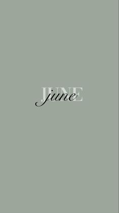 the word june written in black ink on a gray background