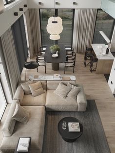 an aerial view of a living room and dining area