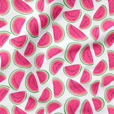 watermelon slices on white fabric with green and pink stripes, all over the surface