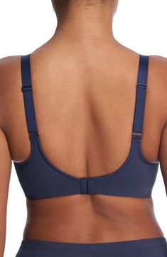 Speed through your workout in this high-impact sports bra specifically engineered with sun-protected and antichlorine-finished stretch fabric. Designed for an active lifestyle, this sports bra can be worn as an everyday bra, sports bra or swimming top. Adjustable straps Moisture-wicking fabric engineered for dryness and comfort UPF 50+ sun protection Partially lined 76% nylon, 24% elastane Hand wash, line dry Imported Full Coverage Light Support Sports Bra In Athleisure Style, Full Coverage Light Support Athleisure Sports Bra, Athleisure Full Coverage Sports Bra With Light Support, Compression Moisture-wicking Full Coverage Sports Bra, Full Coverage Sports Bra With Built-in Bra, 4-way Stretch Full Coverage Activewear For Sports, Compression Sports Bra With Light Support And Full Coverage, Sporty Full Coverage Sports Bra With Medium Support, Sporty Full Coverage Bra With Medium Support