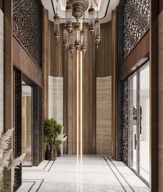 an elegant lobby with chandelier and marble flooring is seen in this rendering