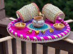 a tray that has some items on it and is sitting on top of a wooden table