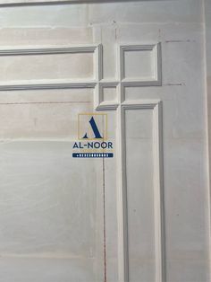 an all - noor logo is on the front door