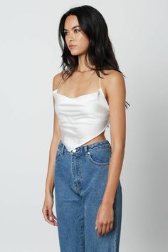 Final Sale-Get it before it's gone! You're going to look amazing in the Not So Basic White Satin Cowl Neck Halter Crop Top! Sleek white woven satin shapes a cowl neck halter neckline and a handkerchief cropped bodice with tie back. Style this bandana with distressed jeans for a cute casual look! DETAILS & CARE Polyester/Spandex. Machine wash cold. Imported. White Satin Top, Handkerchief Top, Bandana Top, Boho Pink, Cowl Neck Top, Bathing Suit Top, Pink Boho, Halter Crop Top, Satin Top