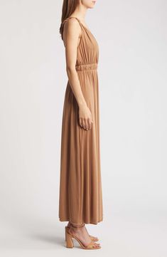 A pleated design creates flowy movement in a romantic maxi dress featuring braided racerback straps and a figure-defining elastic waist. 53" length (size Medium) Surplice V-neck Sleeveless Lined 95% polyester, 5% spandex Machine wash, line dry Imported Flowy Sleeveless Brown Maxi Dress, Brown Flowy Sleeveless Maxi Dress, Brown Sleeveless Ruched Maxi Dress, Brown Maxi Dress With Smocked Back, Flowy Halter Neck Maxi Dress In Solid Color, Flowy Solid Color Halter Neck Maxi Dress, Flowy Halter Neck Solid Maxi Dress, Romantic Maxi Dress, Maxi Sundress