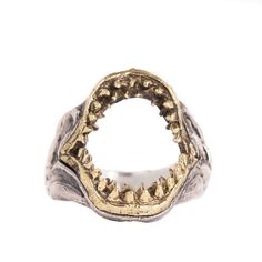 925 sterling silver ring with hand engraved brass shark jaw. Enjoy this powerful, prehistoric animal ring today. Ring Size Available in all sizes. Please be sure to find your exact ring size for the finger you want before ordering. See image chart above or you can use the chart on my website as a guide - https://jewelrylab.co/pages/ring-sizing-tips Every piece is handcrafted in Bali and made with Intention, Love, and Soul so that it can be felt by it's wearer and ultimately change our energy and Celebrity Bracelets, Shark Ring, Shark Jaw, Silver Pinky Ring, Shark Jaws, Chain Link Necklace Silver, Mens Pinky Ring, Animal Ring, Chunky Chain Necklaces