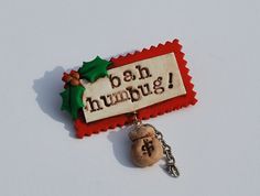 a wooden keychain with a christmas message on it