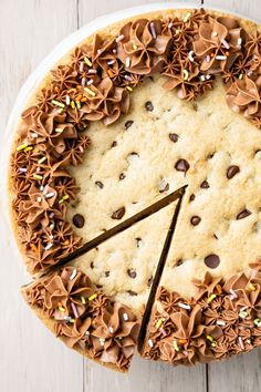 a cake with chocolate chips and sprinkles on it